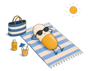 Petite pilule allongée sur une serviette qui prend le soleil